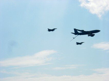 <i>F-16 Falcons trailing a tanker.</i>